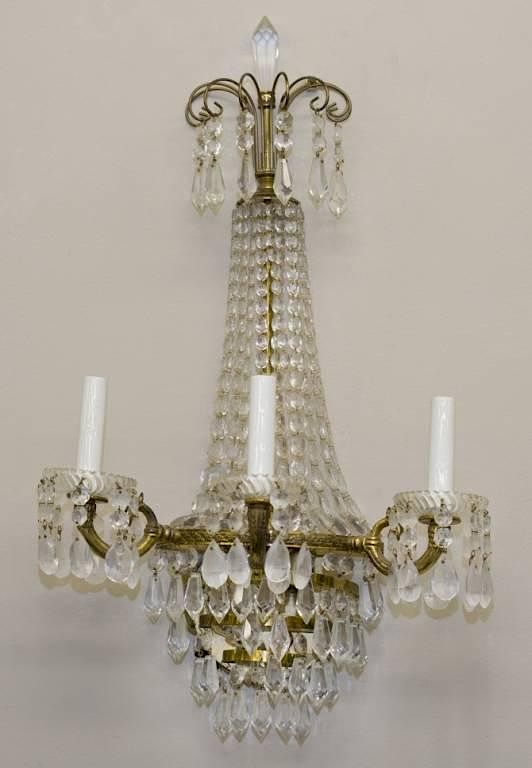 Appraisal: French style crystal sconces A pair of French style electric