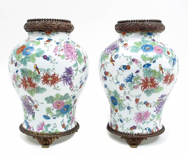 Appraisal: A pair of Continental metal mounted porcelain vases height in