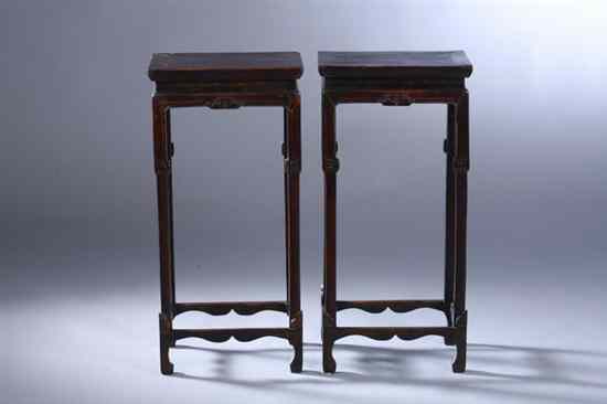 Appraisal: PAIR CHINESE BROWN LACQUERED ELMWOOD STANDS late th century -