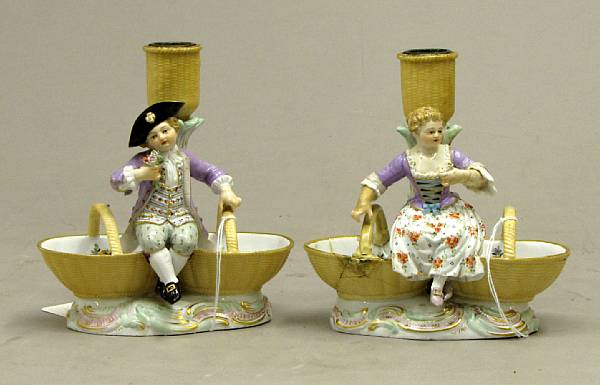 Appraisal: A pair of Meissen porcelain figural combination candlestick and double