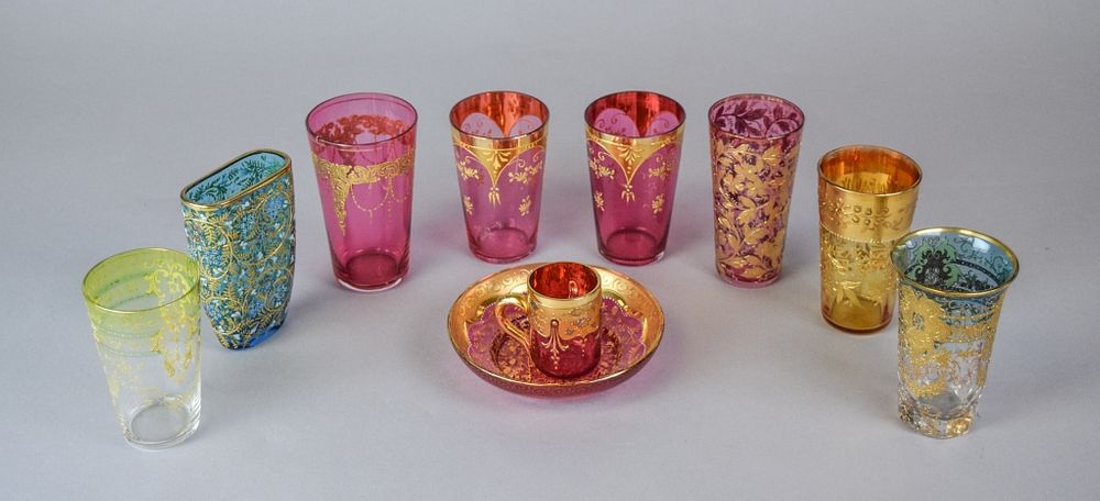 Appraisal: Grouping of Bohemian Glass cranberry colored glasses of varying heights