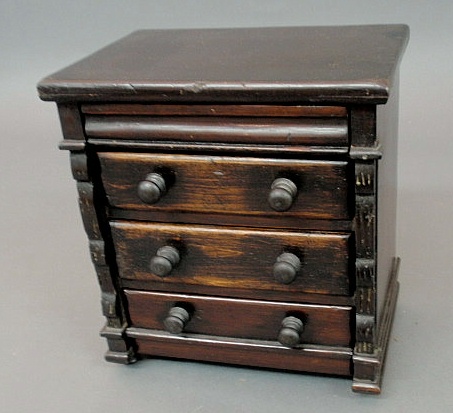 Appraisal: Miniature Empire chest of drawers c black paint over pine