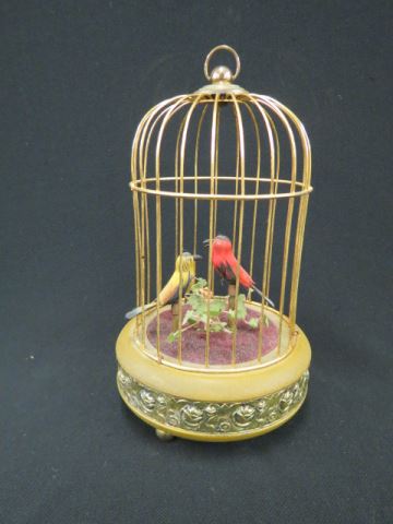 Appraisal: Bird in Cage Music Box two birds mechanical tall working