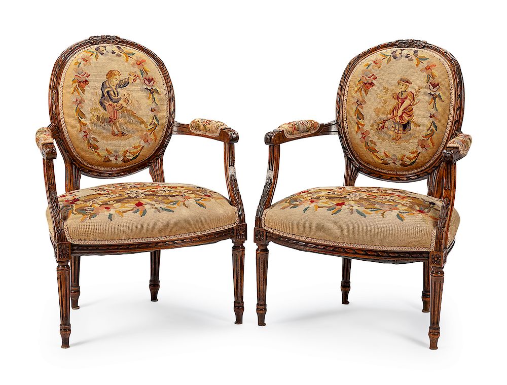 Appraisal: A Pair of Louis XVI Style Needlepoint-Upholstered Fauteuils A Pair