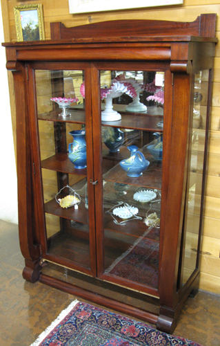 Appraisal: A MAHOGANY EMPIRE REVIVAL CHINA DISPLAY CABINET American c having