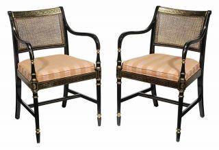 Appraisal: Pair Regency Style Ebonized Parcel Gilt and Caned Open-Arm Chairs