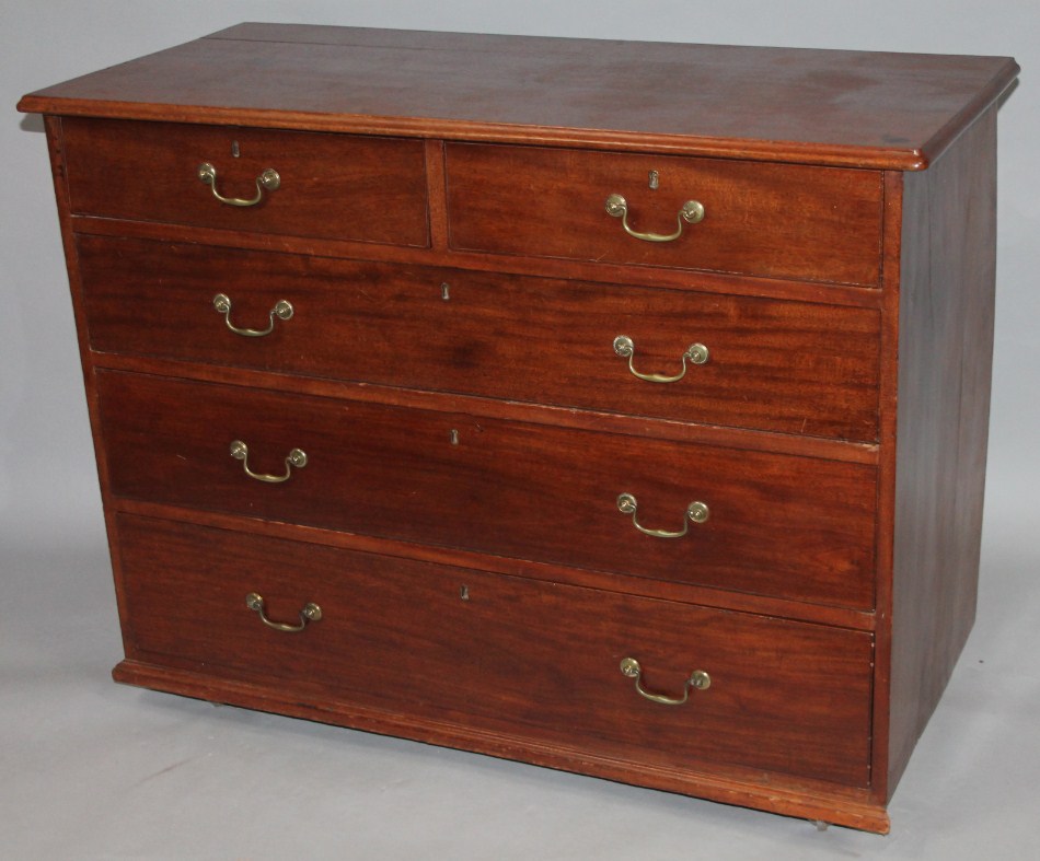 Appraisal: An early thC mahogany chest of two short and three