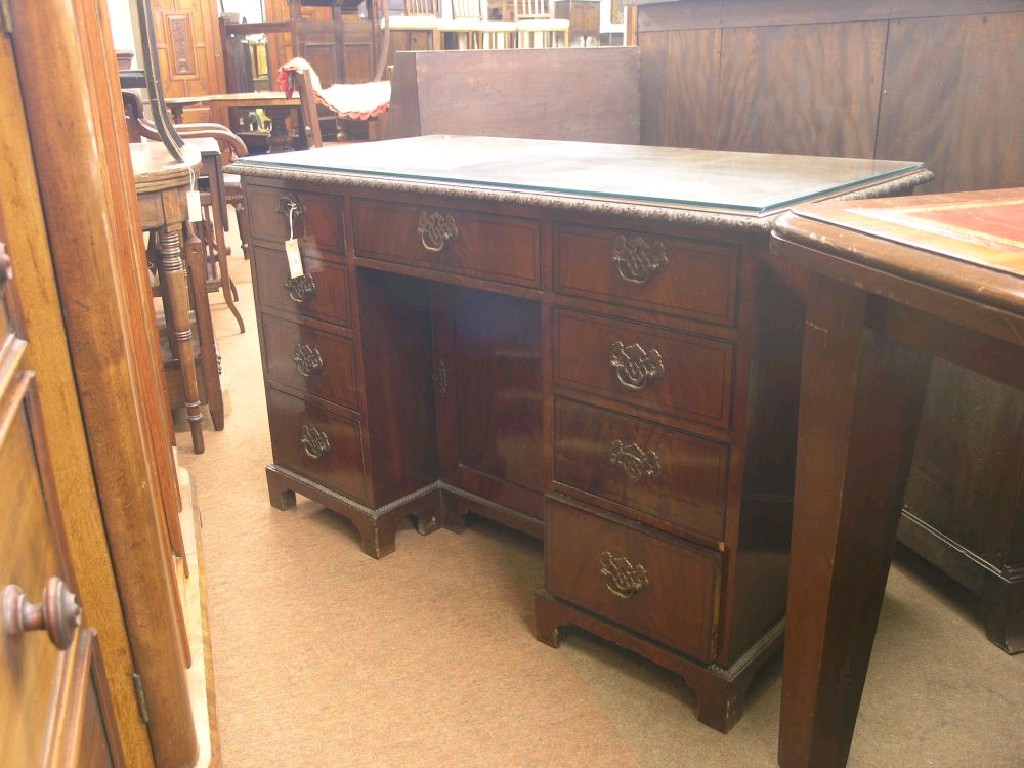 Appraisal: A good early th century mahogany desk the top with