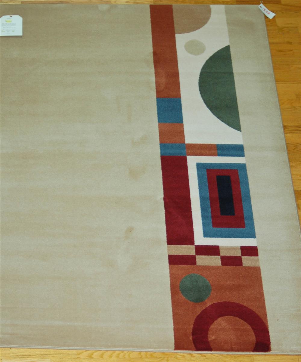 Appraisal: KARASTAN CONTEMPORARY WOOL RUG consisting of an oatmeal field with