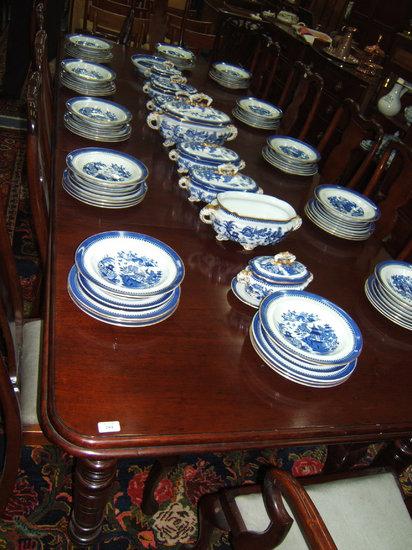 Appraisal: A Victorian style mahogany wind out dining table with turned