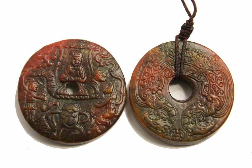 Appraisal: PAIR CHINESE ROBE WEIGHTS - Pair Chinese Carved Bloodstone Robe