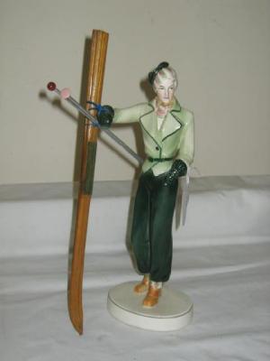 Appraisal: A 'S PERIOD KATZHUTTE EARTHENWARE FIGURE of a female skier