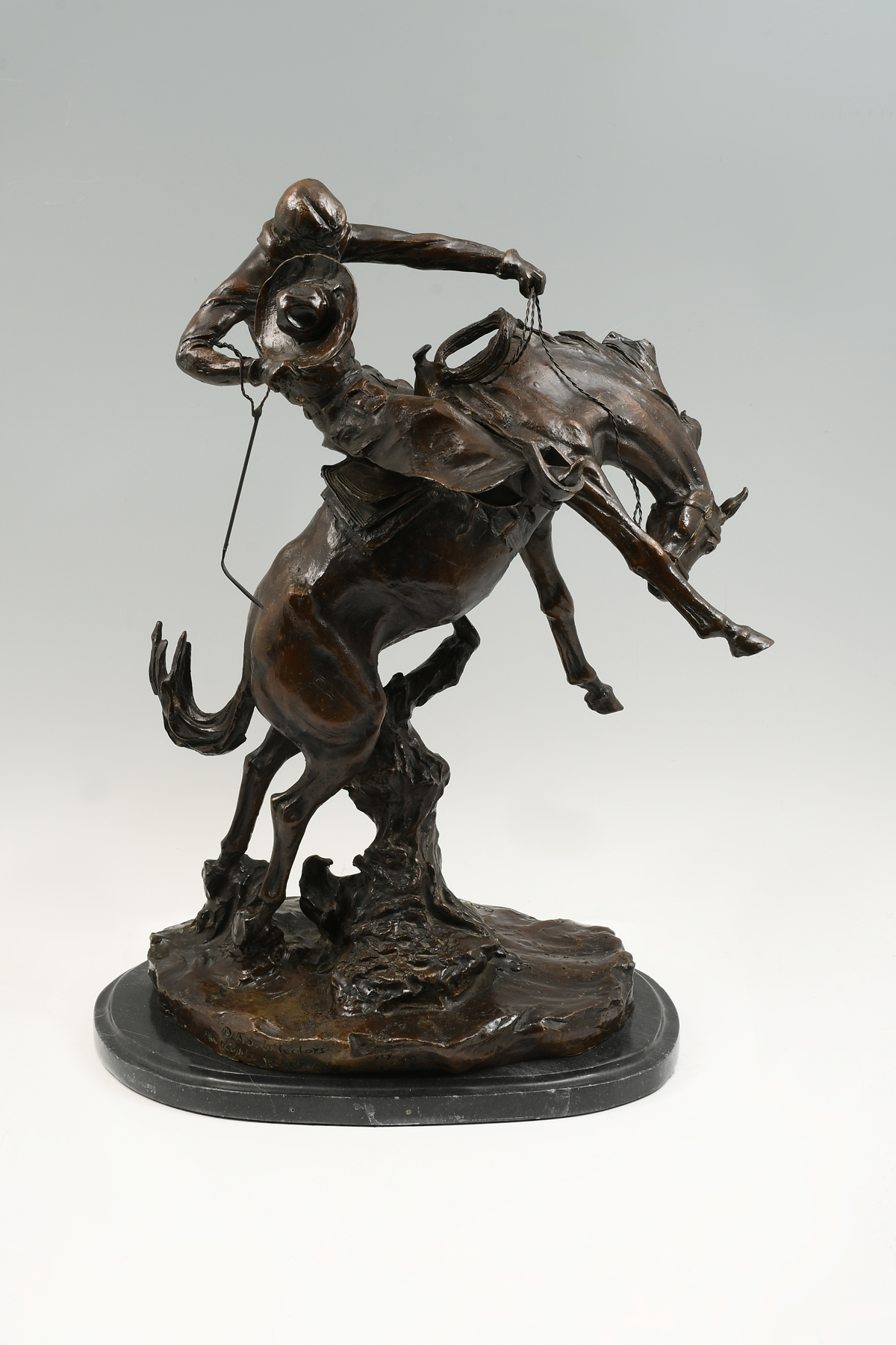 Appraisal: AFTER CHARLES MARION RUSSELL ''BRONCO TWISTER'' BRONZE Cast bronze sculpture