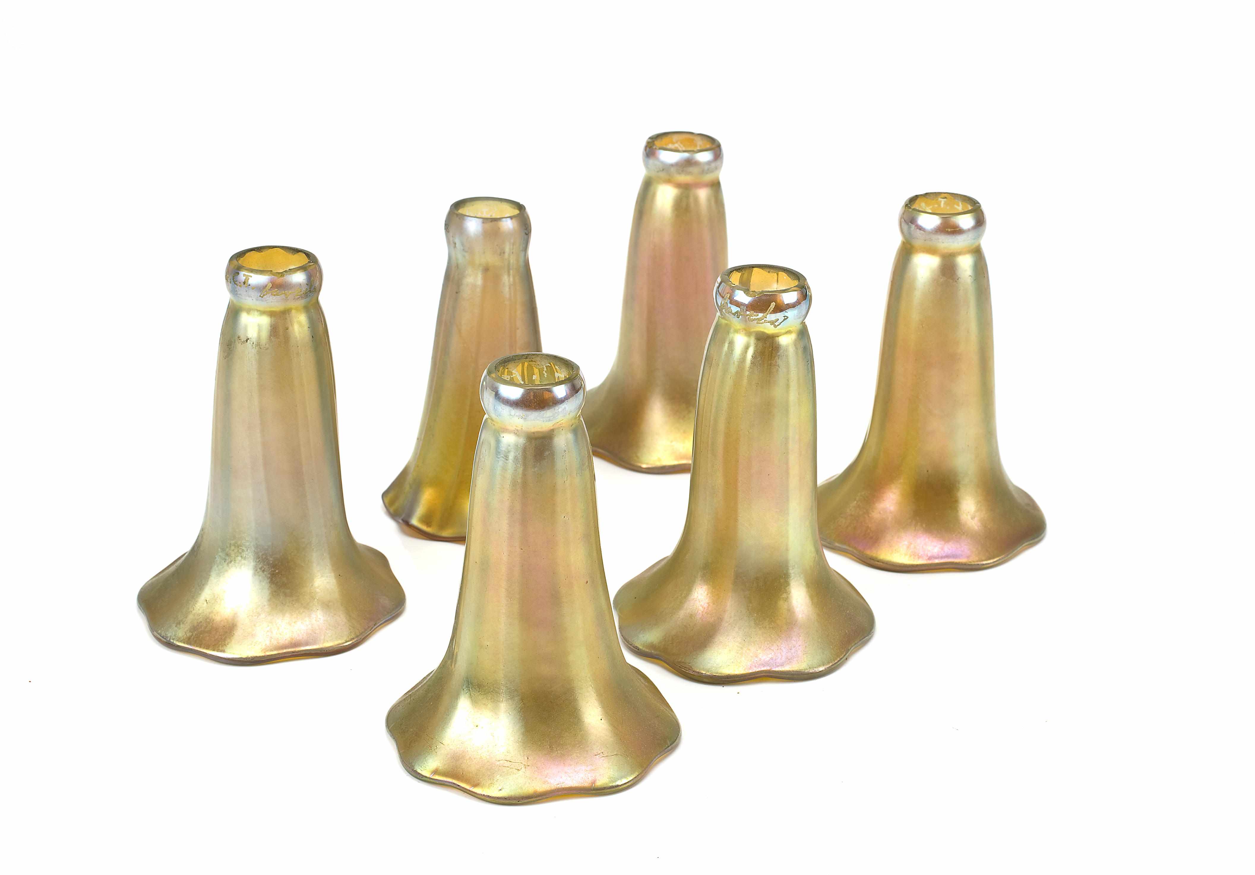 Appraisal: An assembled group of twenty two iridescent glass lily shades