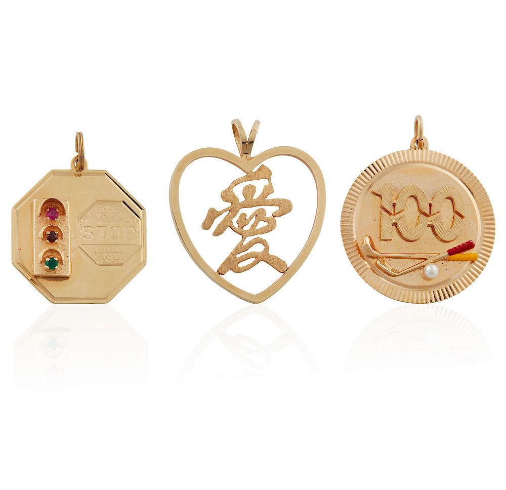 Appraisal: Three k Gold Pendants grams Three assorted k gold pendants