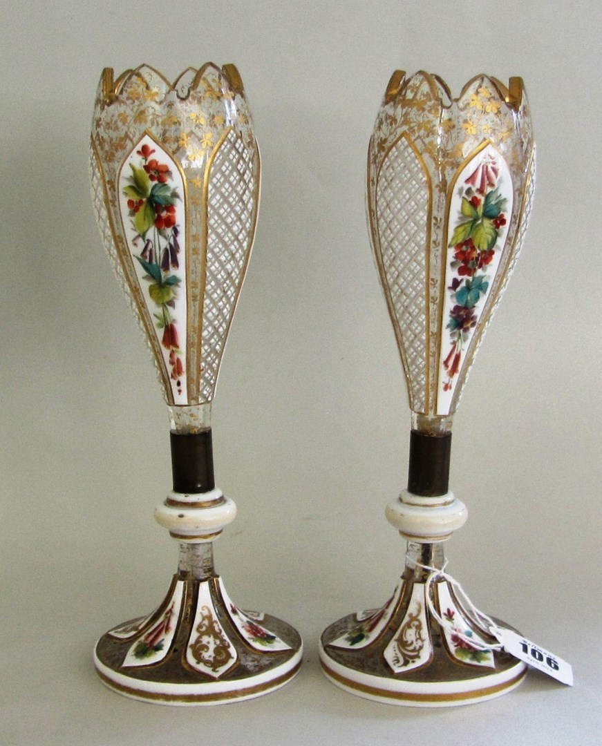 Appraisal: A pair of Bohemian overlay and enamelled glass vases late