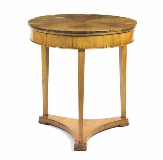 Appraisal: A Biedermeier Occasional Table th century having a circular top