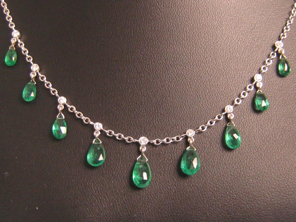 Appraisal: A Continental Emerald and Diamond Fringe Necklace the front collet-set