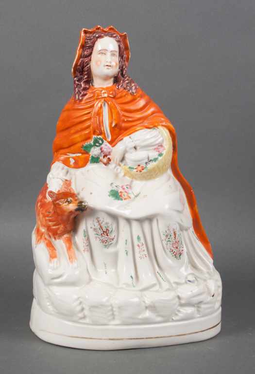 Appraisal: Staffordshire painted earthenware figural group of ''Red Riding Hood and