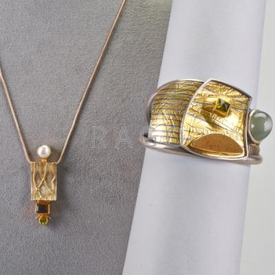 Appraisal: CONTEMPORARY STUDIO JEWELRY Two pieces Sterling k and k gold