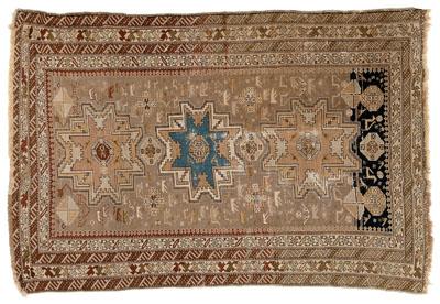 Appraisal: Kazak rug three central medallions on faded brown field ft