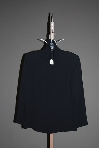 Appraisal: Andr Laug black silk long sleeve blouse with cowl collar