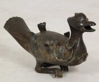 Appraisal: ORIENTAL BRONZE SCULPTURE OF A DUCK CAST IN A FOLIATED