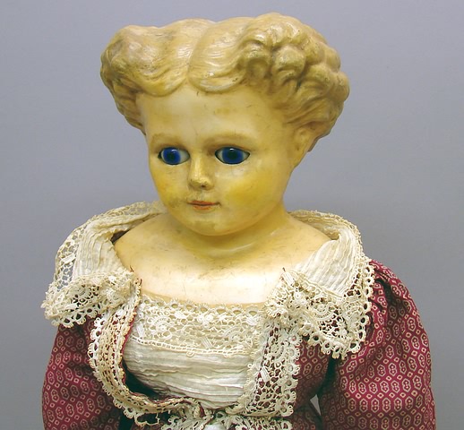 Appraisal: Wax over papier mache doll with blue sleep eyes She