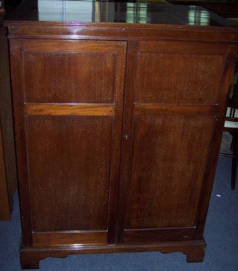 Appraisal: A Victorian mahogany dwarf linen press fitted four sliding trays