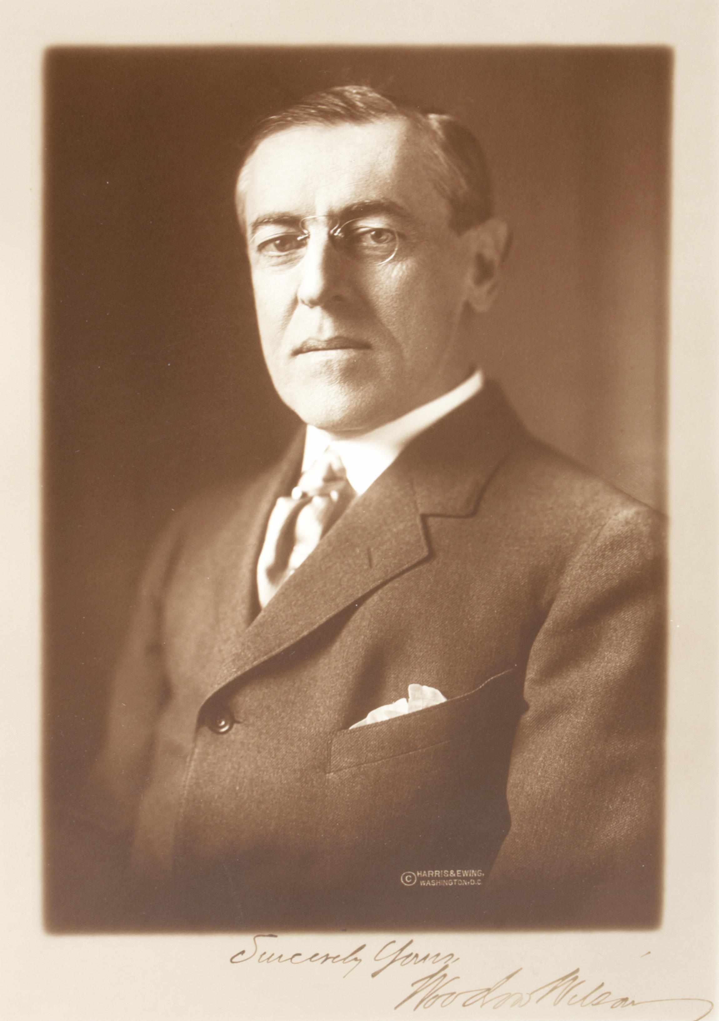 Appraisal: WOODROW WILSON SIGNED PHOTOGRAPH by inch sepia tone silver print