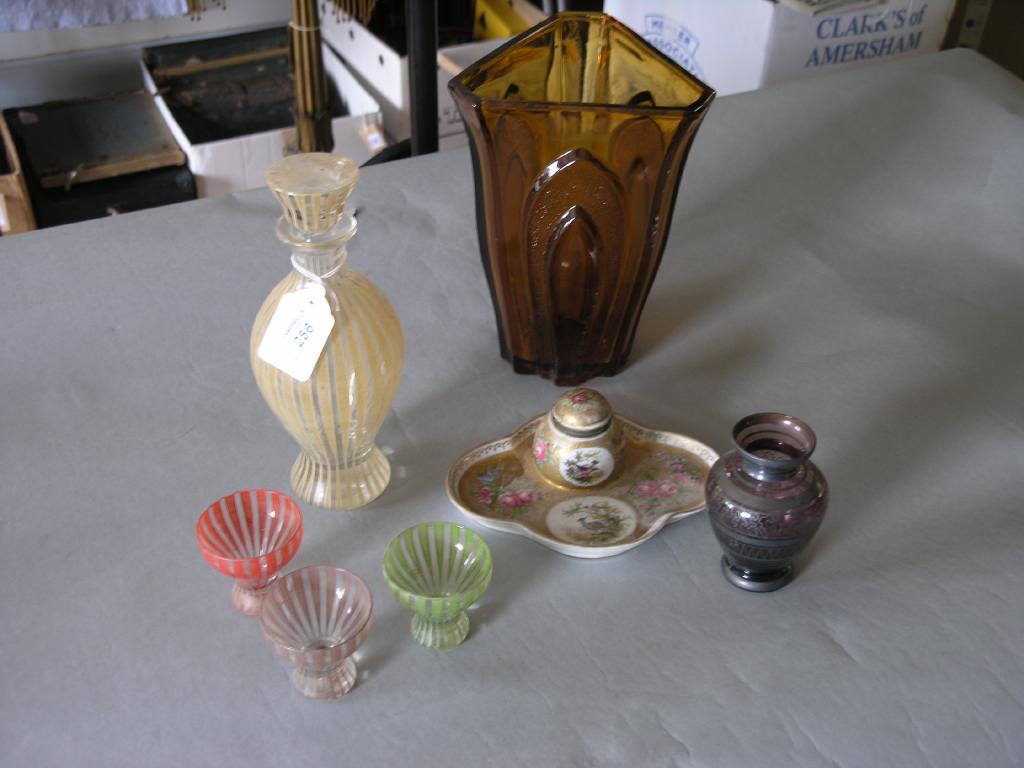 Appraisal: A 's coloured glass liqueur set including decanter in amber