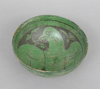 Appraisal: A Persian Bird Bowl A bird painted in black glaze