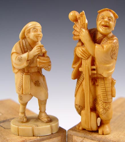 Appraisal: TWO JAPANESE ELEPHANT IVORY CARVED OKIMONO Hand carved from elephant