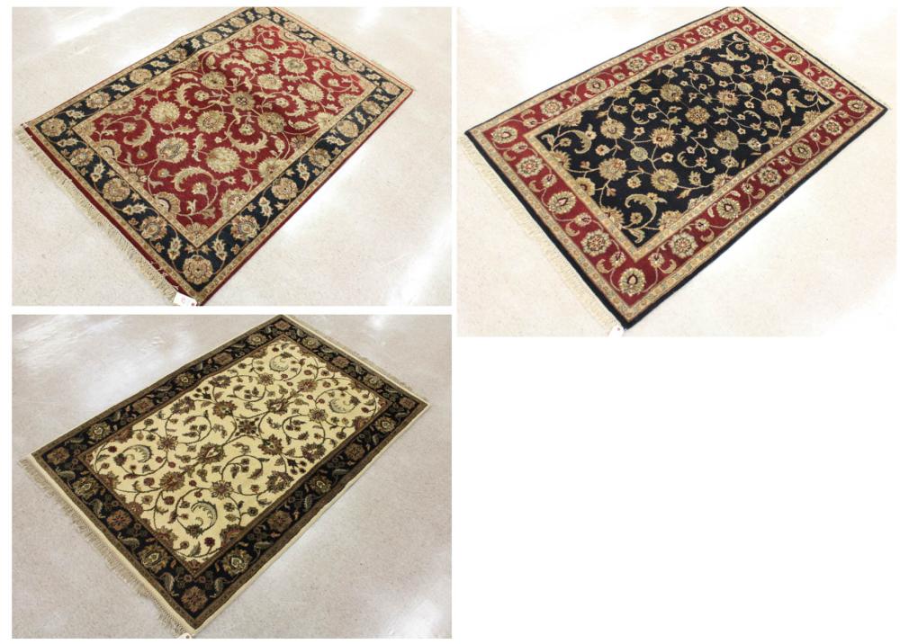 Appraisal: THREE HAND KNOTTED ORIENTAL AREA RUGS Indo-Persian similar overall floral