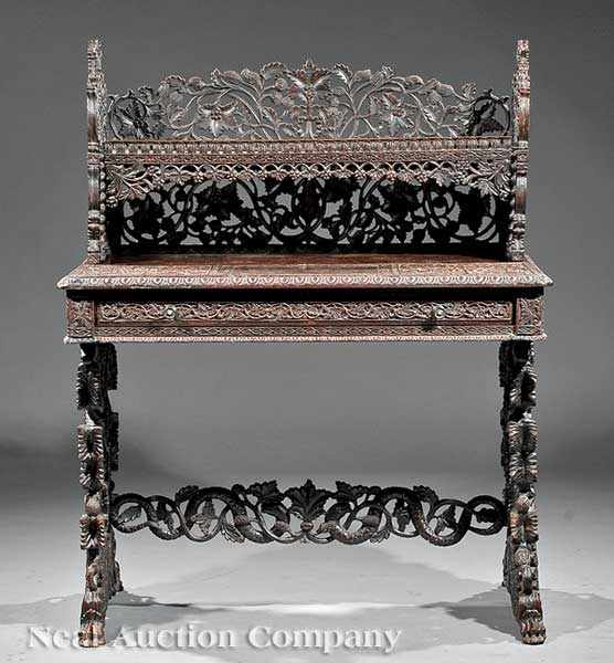 Appraisal: An Anglo-Indian Carved Hardwood Desk c highly carved with flowers