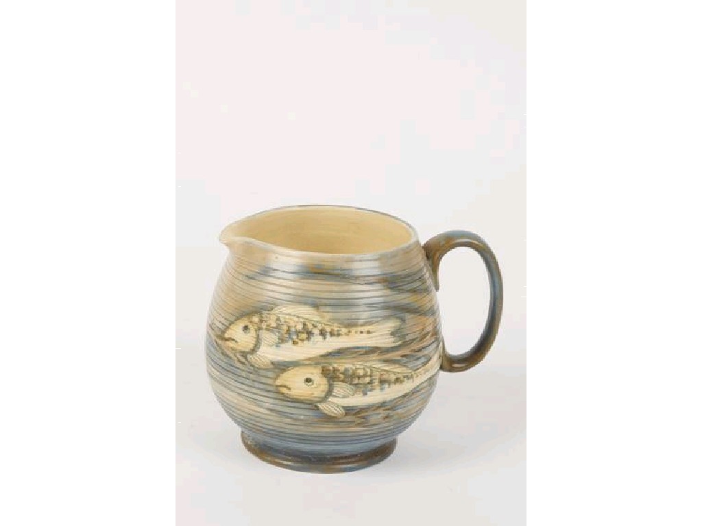 Appraisal: A SALT GLAZED JUG decorated with swimming fish against a