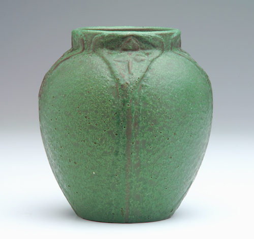 Appraisal: VAN BRIGGLE Bulbous vase embossed with trefoils under a rich