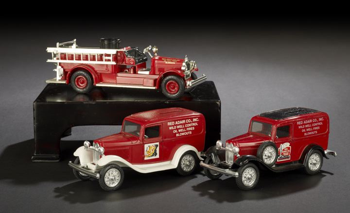 Appraisal: Group of Three Red Adair and Company Die-Cast Model Banks