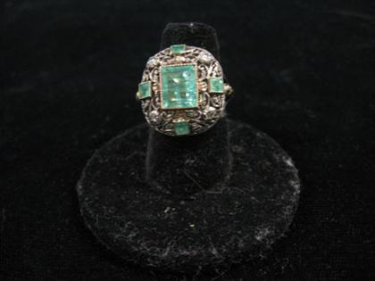 Appraisal: Emerald medicine ring Filigree silver and karat yellow gold ring