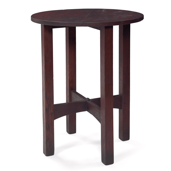 Appraisal: Gustav Stickley tea table circular top over anarched cross-stretcher base