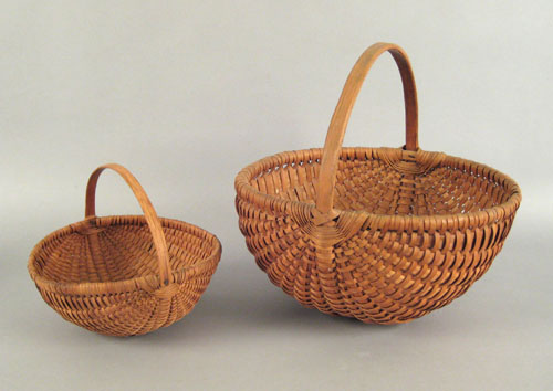 Appraisal: Two Pennsylvania split oak carrying baskets ca h dia