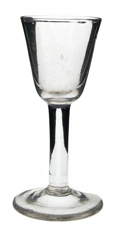 Appraisal: A GEORGE III WINE GLASS the rounded funnel bowl on