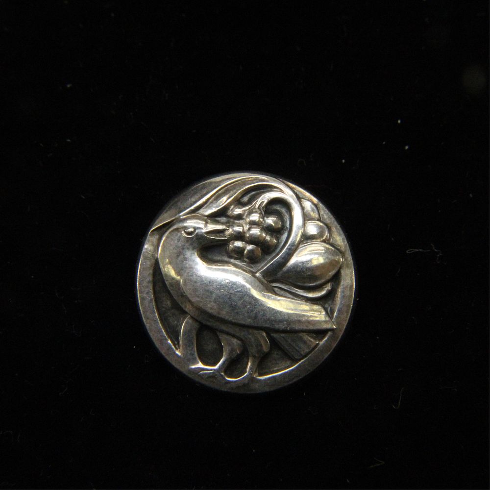 Appraisal: Georg Jensen Bird Eating Berries c Georg Jensen sterling silver