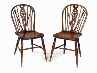 Appraisal: A set of five th century wheelback Windsor side chairs