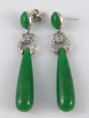 Appraisal: A pair of white metal tests carat gold jade and