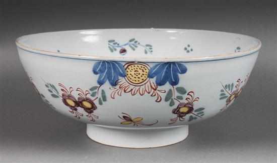 Appraisal: Liverpool polychrome Delftware punch bowl circa exterior with floral decoration