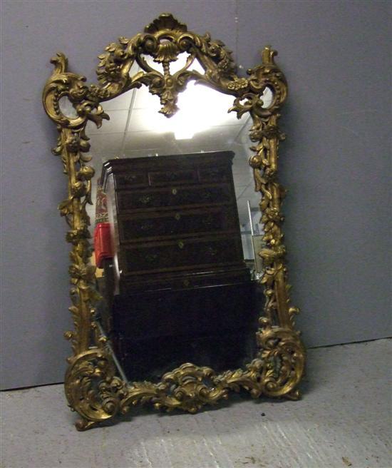 Appraisal: th century gilt gesso wall mirror with shell finial and