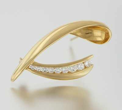 Appraisal: A Ladies' Diamond Brooch k yellow gold brooch with curvilinear