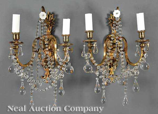 Appraisal: A Pair of Gilt Bronze Two-Light Wall Sconces anthemion mounted