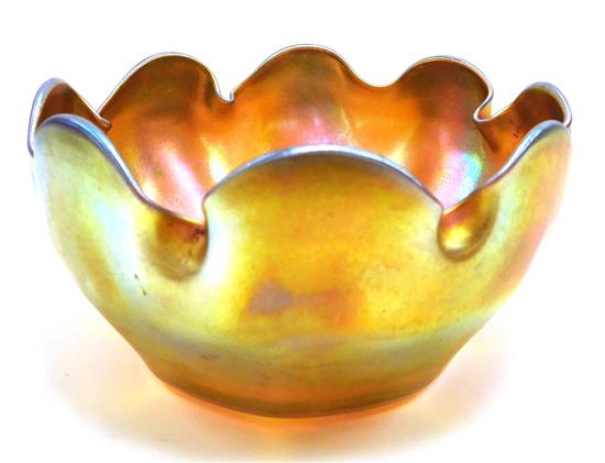 Appraisal: Louis Comfort Tiffany Favrile finger bowl with scalloped rim iridescent